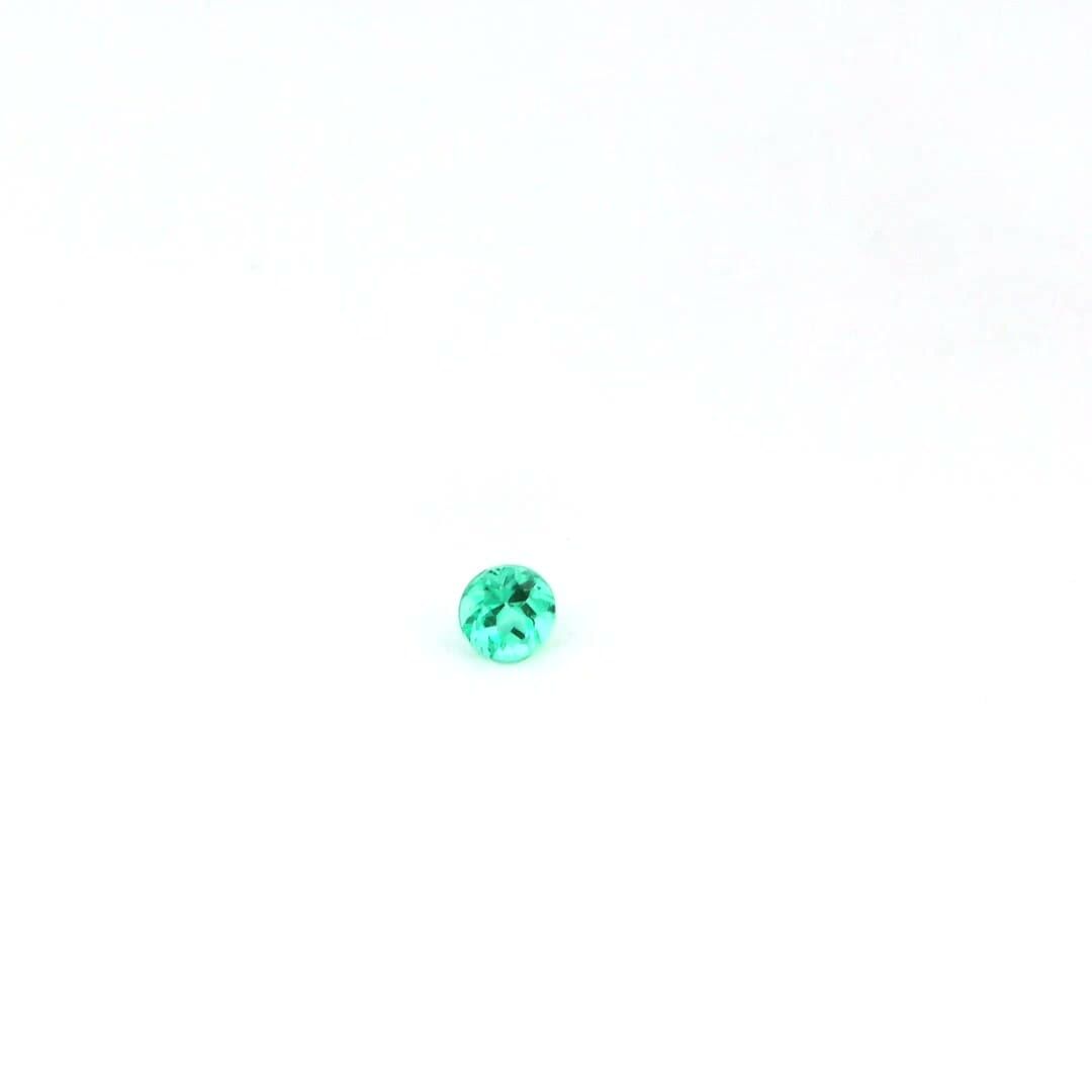 0.14 Carat Round Emerald